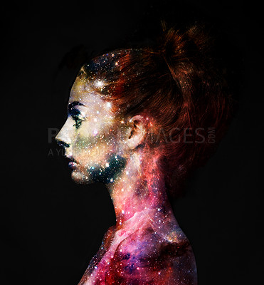 Buy stock photo Profile of a young woman with the galaxy overlaid on her face