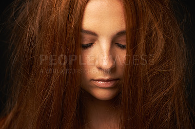 Buy stock photo Depression, thinking or sad woman in studio with trauma stress, fail or bad results alone. Black background, psychology or face of a lonely female person with anger, messy hair or moody attitude 