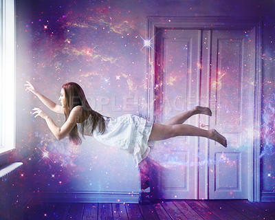 Buy stock photo A young woman floating out of a window in a dreamlike state