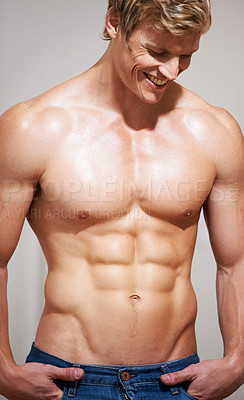 Buy stock photo Man, bodybuilder and abs with smile, sexy and shirtless for body, strong or model in studio background. Confident, workout and fitness with muscle, chest and stomach for health, exercise or training 