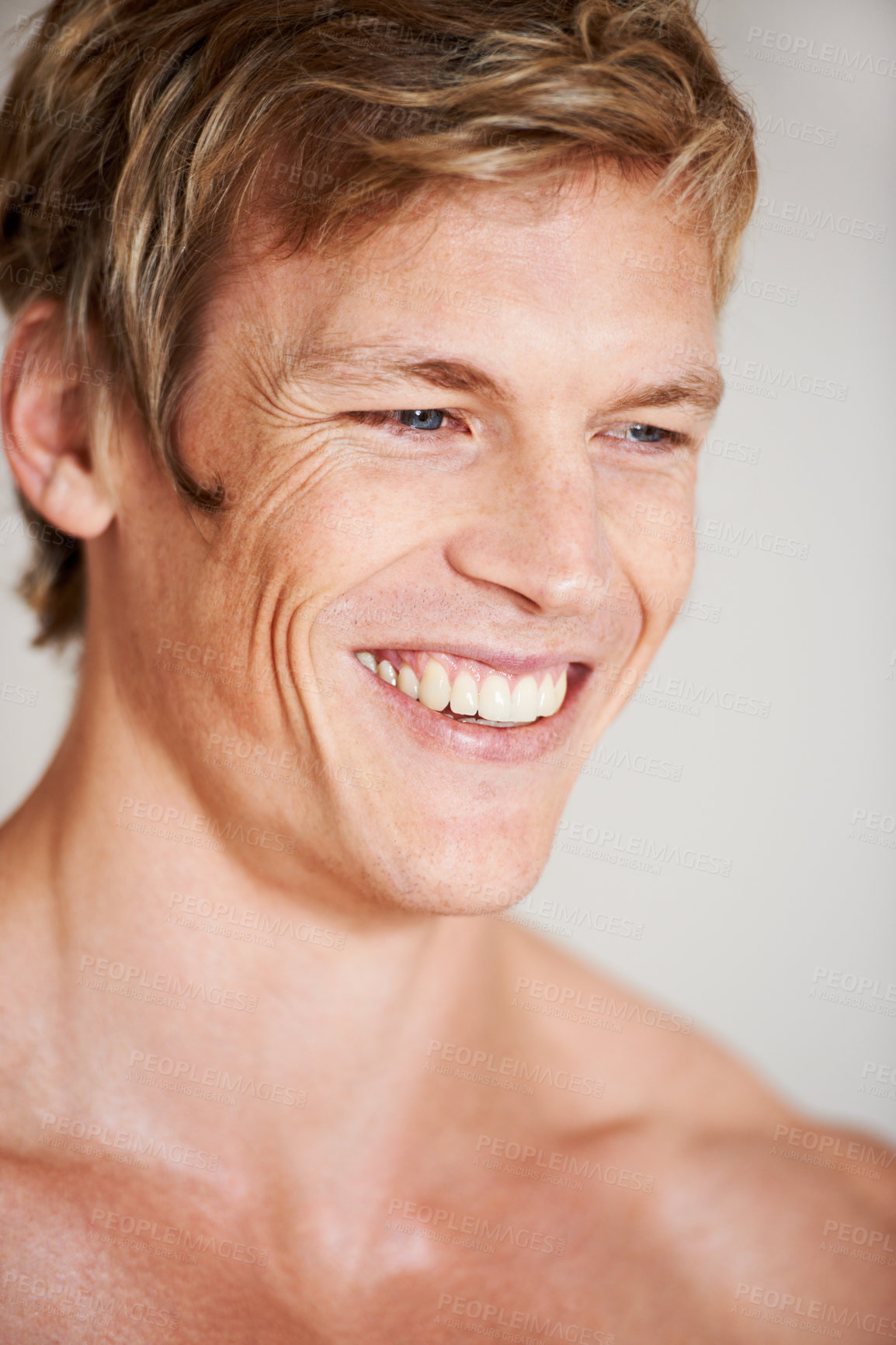 Buy stock photo Man, topless and smile in studio or white background for positive energy, healthy or confidence. Male person, model or shirtless relax masculine for strong shoulders or attractive, calm or muscle