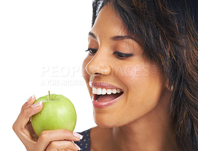 Buy stock photo Black woman, studio and apple with diet, lifestyle and hungry for healthy, organic snack and eating by white background. Woman, smile and natural green fruit for detox, energy or wellness by backdrop