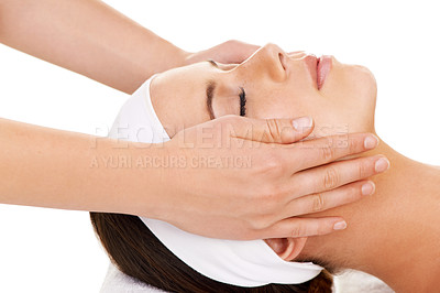 Buy stock photo Face, hands and facial massage with a woman customer in studio isolated on a white background for stress relief. Spa, luxury treatment and a young person at the salon for health, wellness or to relax