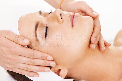 Buy stock photo Head, hands and massage with a woman customer in studio isolated on a white background for stress relief. Spa, luxury face treatment and a young person at the salon for health, wellness or to relax