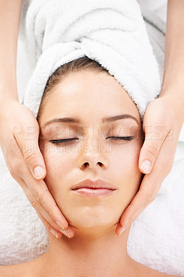 Buy stock photo Spa massage, peace and hands on face of woman from above at resort for stress relief or wellness. Top view, facial and female client with masseuse at beauty salon for luxury, skincare or dermatology