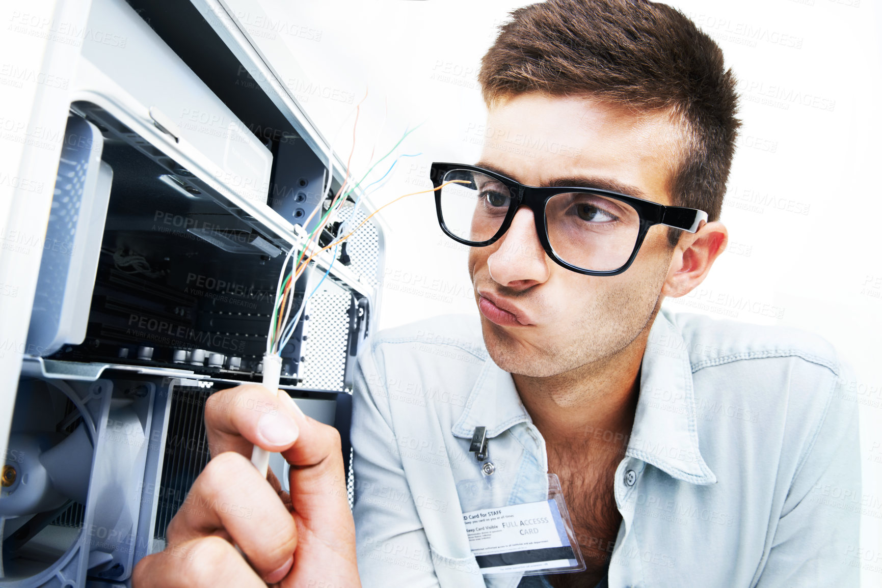 Buy stock photo Computer tower, wires and man repair studio hardware, electronics or check machine crisis, fail or disaster. System maintenance, service industry or IT specialist problem solving on white background
