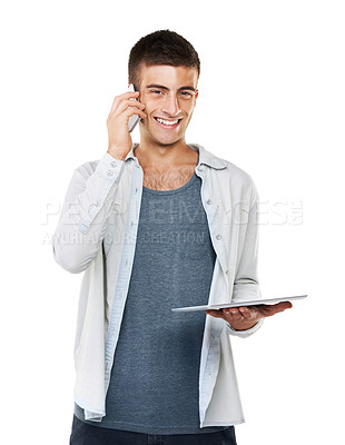Buy stock photo Man, tablet and phone for communication in studio for mockup of call on white background. Portrait, smile and happy for conversation on mobile app, social media and internet by connectivity in space