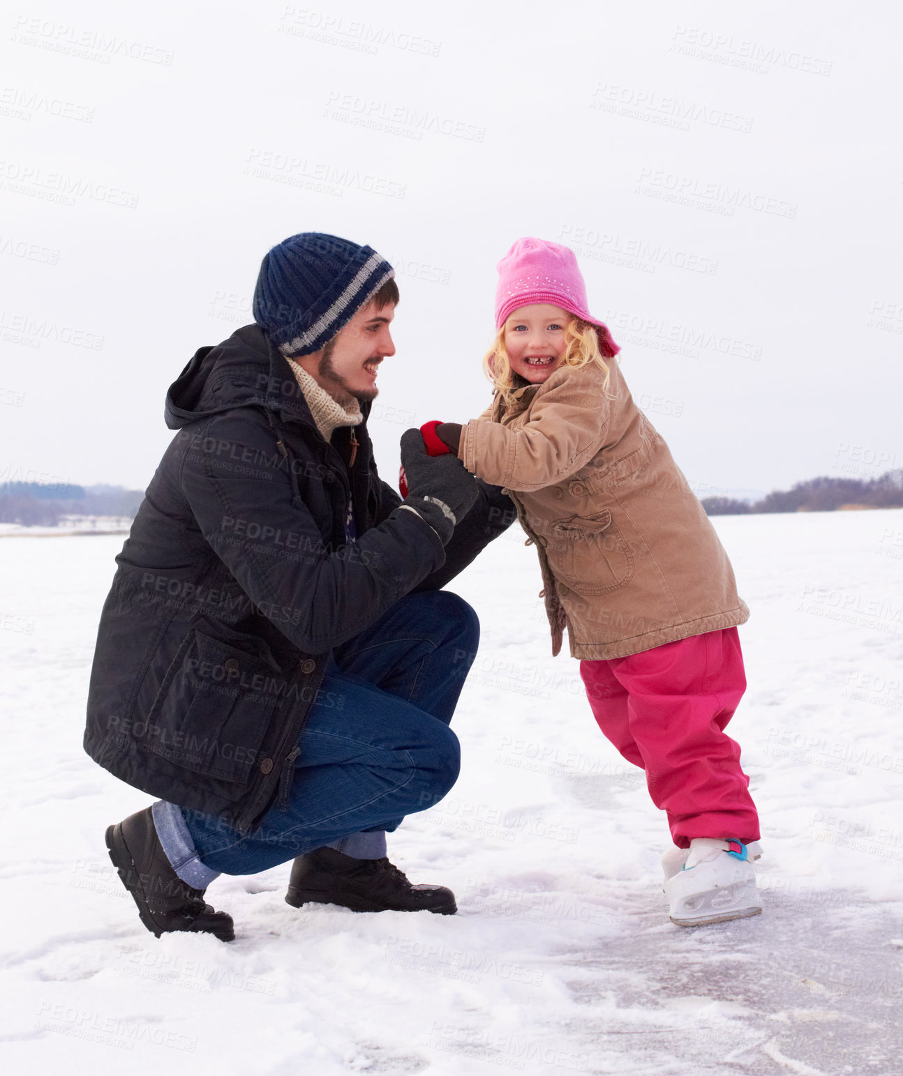 Buy stock photo Father with daughter outdoor, learn to ice skate and fun in nature with snow, winter and people skating on frozen lake. Man have fun with girl child, teaching and learning with sports and recreation