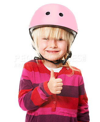 Buy stock photo Studio shot of a cute little blonde girl wearing a cycling helmet showing thumbs up