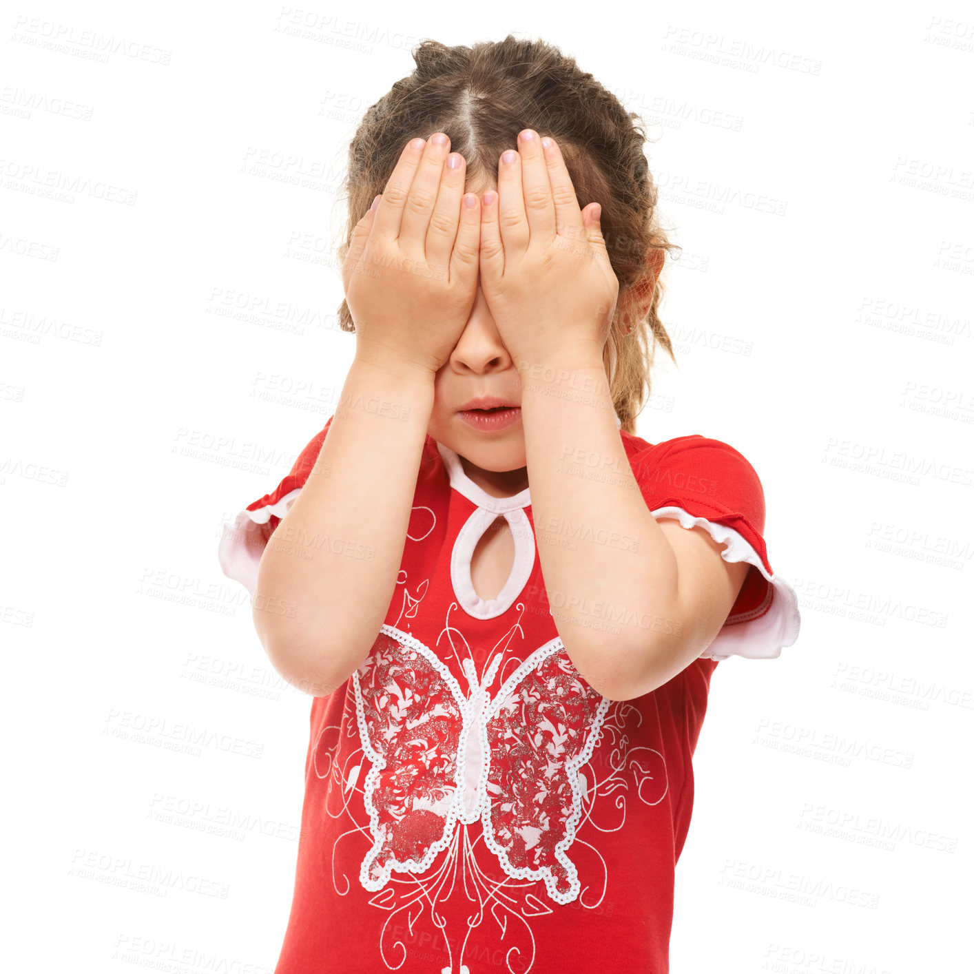 Buy stock photo Cute little girl covering her eyes against a white background