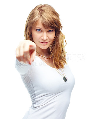 Buy stock photo Studio shot of a beautiful young woman pointing at the camera isolated on white