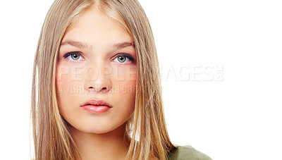Buy stock photo Young, portrait and girl model in studio with mock up space doing serious, confident and natural pose. Beauty, headshot and face of beautiful female teenager posing while isolated by white background