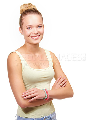 Buy stock photo Portrait of a smiling teenage girl standing with arms folded
