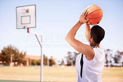 Buy stock photo Man, player and shot on basketball outdoor court for point jump athlete, game challenge in summer. Male person, arm and sport score at hoop for exercise fun or fitness training action, active in park