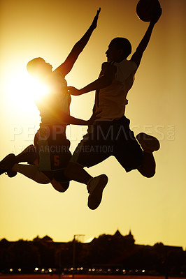 Buy stock photo Man, basketball and jumping silhouette with sport, fitness ad exercise outdoor on court with game. Dunk, athlete and challenge of a player with training and workout match and competition with sunset