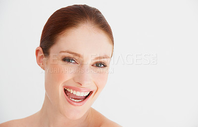 Buy stock photo Portrait of a young woman laughing