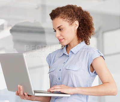 Buy stock photo Business woman typing on laptop in office, creative startup and company for research on internet. Professional copywriter on computer for writing blog, article and reading email or planning on tech