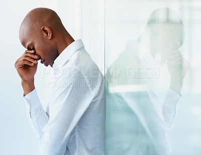 Buy stock photo Business stress, headache and black man in office with crisis, problem or fail on mockup. Sad, depression and male person with fatigue, tired or burnout, anxiety and mental health in workplace.