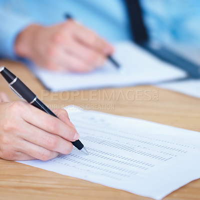 Buy stock photo Business people, hands and writing on finance spreadsheet for accounting, budget or expenses on form. Hand of accountants working on financial report, documents or paperwork with pen on office desk