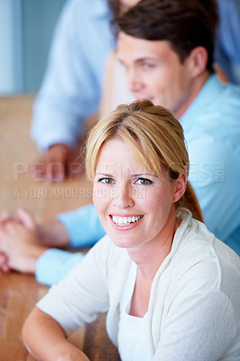 Buy stock photo Woman, portrait and smile in team meeting, office and collaboration or teamwork, workshop and seminar. Happy people, confidence and positive mindset at company, future and growth or face in boardroom