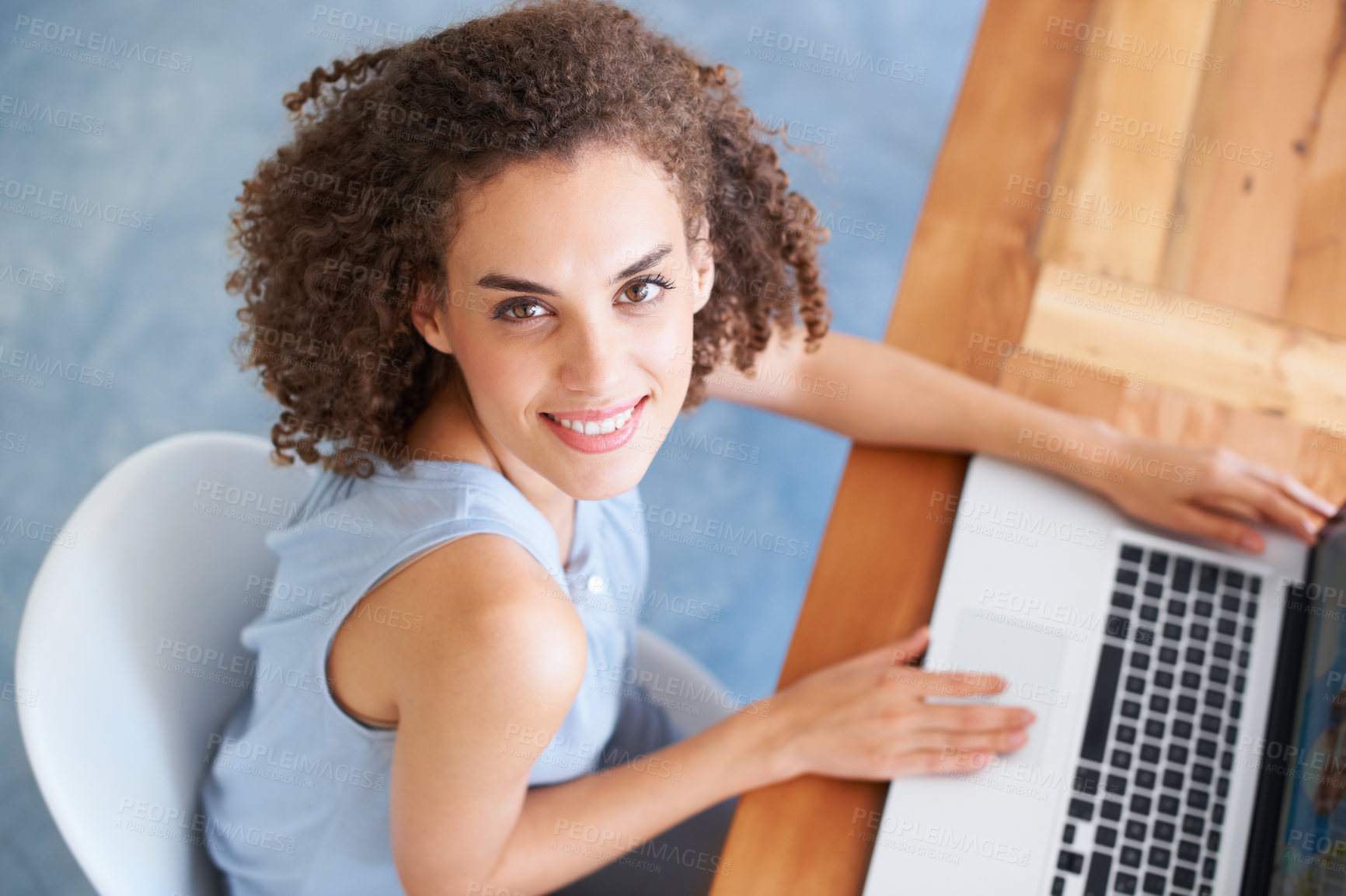 Buy stock photo Top view, portrait and woman with a laptop, business and keyboard with typing, startup success and new project. Face, female employee and consultant with a pc, technology and search internet for info