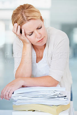 Buy stock photo Stress, pile of paperwork and business woman overworked, exhausted and tired in office. Burnout, stack of documents and female person with depression, fatigue and overwhelmed with anxiety at work.