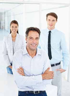 Buy stock photo Portrait, leadership and business people with arms crossed for teamwork in office. Collaboration, leader and happy group of employees, men and woman, team building and confidence in company workplace