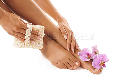 Buy stock photo Pedicure, scrub and woman with skincare, feet and natural beauty for female isolated on white studio background. Lady, flower and foot with cosmetics, cleaning and luxury spa treatment for grooming
