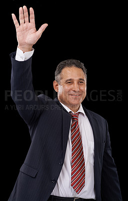 Buy stock photo Government, politician and man on black background with hand for wave, greeting and support. Success, political campaign and person with gesture for leadership, pride and winning election in studio