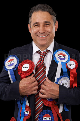 Buy stock photo Man, vote and suit for politician, ribbons and candidate for support, government and politics. Elections, voter choice and representative for party, registration and democracy for voting register 
