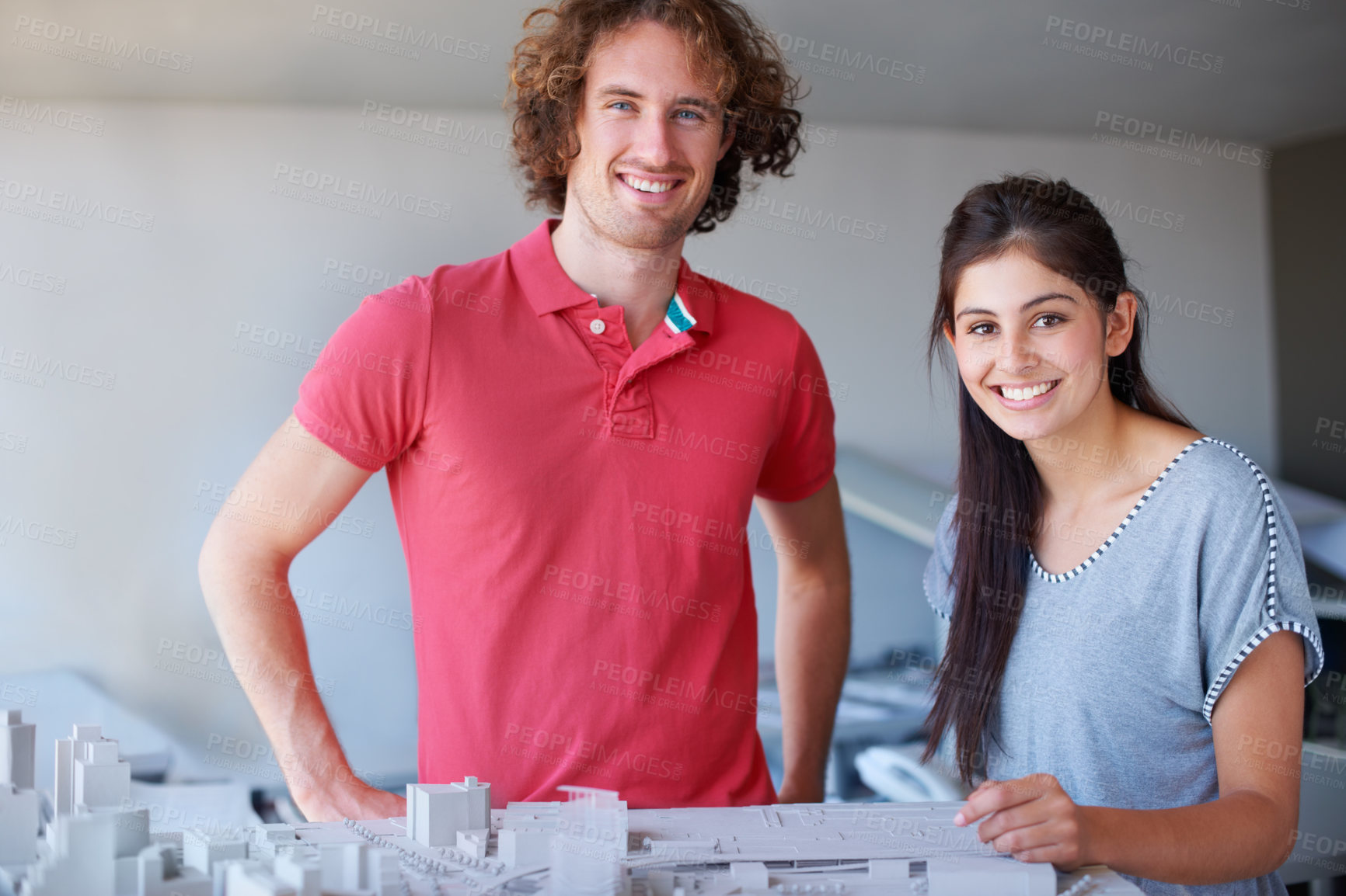 Buy stock photo Architecture model, professional portrait and happy people planning development, project or buildings design. Partner teamwork, engineering or architect on property, construction or infrastructure