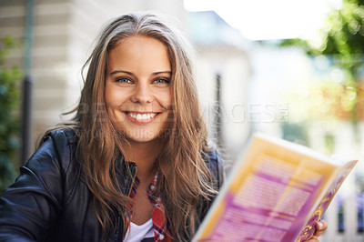 Buy stock photo College student, reading and portrait with book outdoor at university campus or city. Woman, relax and learn from studying books, textbook or research knowledge for english literature education info