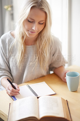 Buy stock photo Research, coffee and woman writing in a book at home for idea, planning or creative, goal or study notes. Notebook, education or lady student in house with tea while brainstorming homework assignment