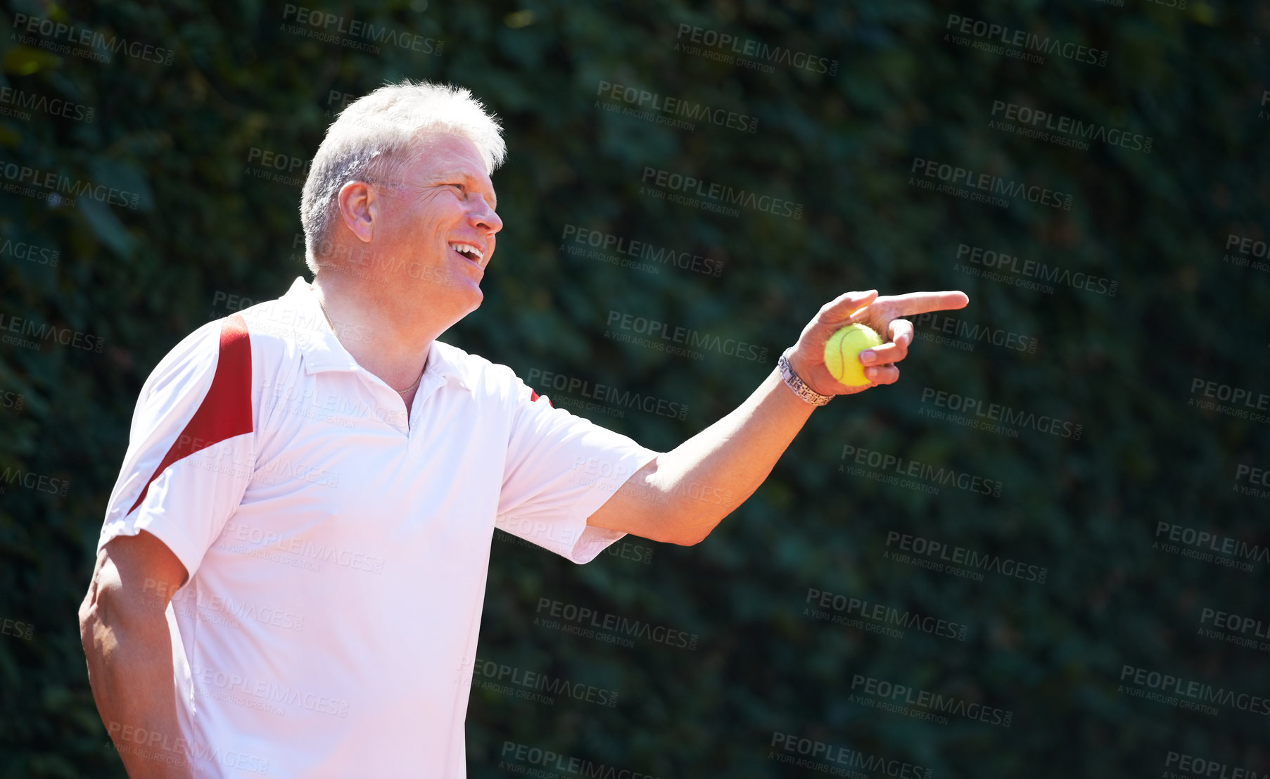 Buy stock photo Happy, senior man and game of tennis on court for exercise, workout and training in sport. Hand, pointing and mature person smile with energy, fitness and playing in healthy competition in retirement