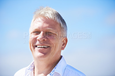 Buy stock photo Portrait, smile and happy senior man outdoor for travel, freedom or journey on blue sky background. Face, relax and old male person outside with positive attitude, fresh air or retirement vacation