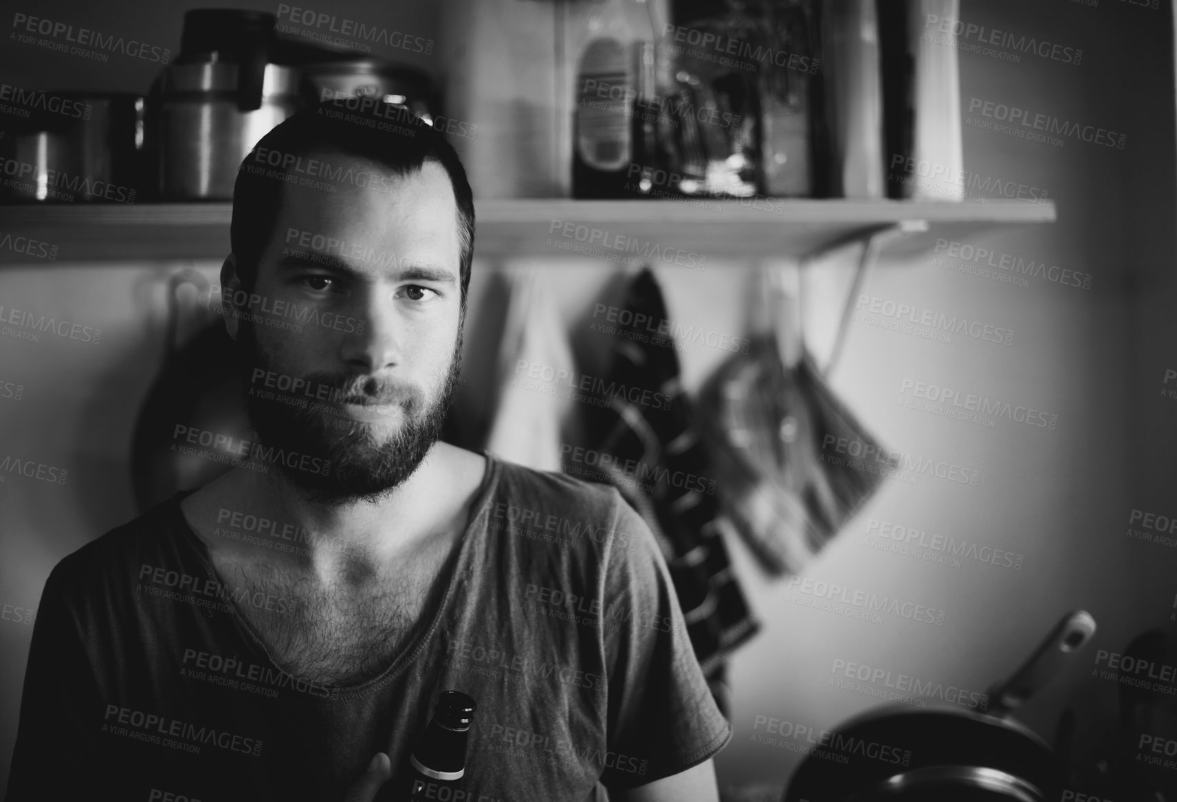 Buy stock photo Home, man and portrait in a kitchen with drink and monochrome with black and white. Male person, calm smile and beard ready for cooking in a house with a beverage and drink relax with alcohol and art