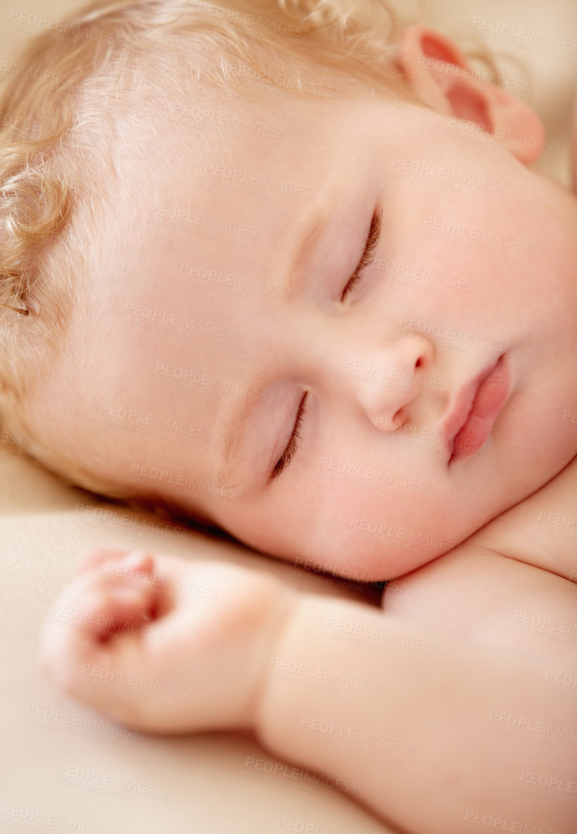 Buy stock photo Tiny baby boy lying fast asleep