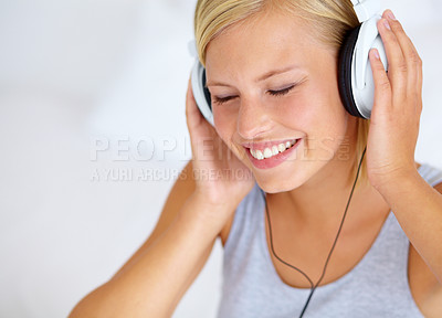 Buy stock photo Home, headphones and woman with music, smile and streaming sound with radio, peace and calm. Zen person, technology or girl with headset, podcast audio and playlist with connection, song or listening