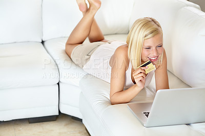Buy stock photo Relax, sofa and happy woman with laptop, credit card and online shopping with payment in home. Ecommerce, smile and girl on couch on web store for discount deal, offer or internet sale in living room