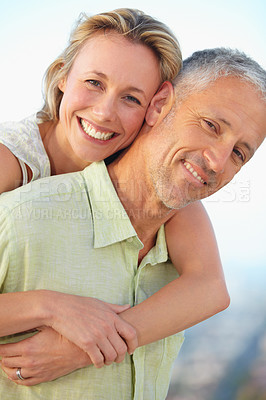 Buy stock photo Happy couple, portrait and hug for love, care or romance together on holiday, vacation or outdoor weekend. Face of mature married woman hugging man with smile in embrace, bonding or honeymoon getaway