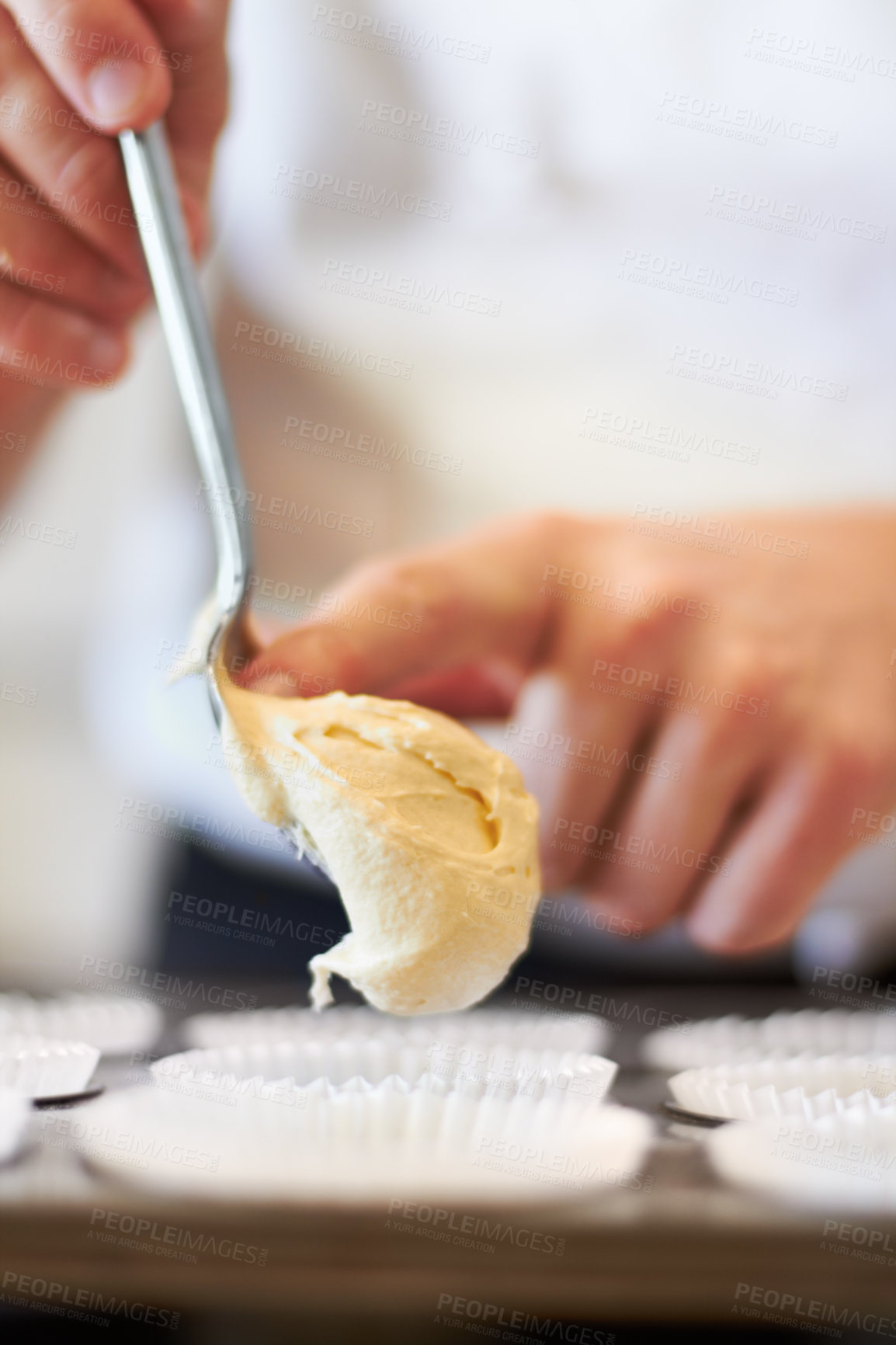 Buy stock photo Closeup, hands and cupcake dough in tray with baker, small business owner and professional chef. Cooking, bakery and cake in baking pan for food, job and start process for muffins in shop kitchen