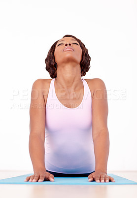 Buy stock photo Woman, yoga and stretching in fitness for zen, spiritual wellness or pilates workout on the mat. African female yogi in svanasana pose for healthy body, relax or warm up stretch in training exercise