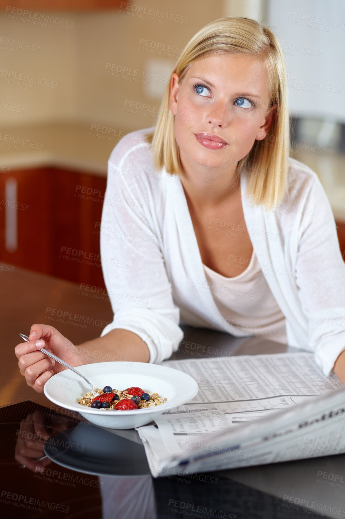 Buy stock photo Shot of a beautiful young woman looking