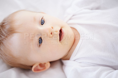 Buy stock photo Home, bed and face of baby relax, resting and calm in nursery for sleeping or wake up in morning. Family, youth and closeup of infant newborn in bedroom for child development, growth and wellness