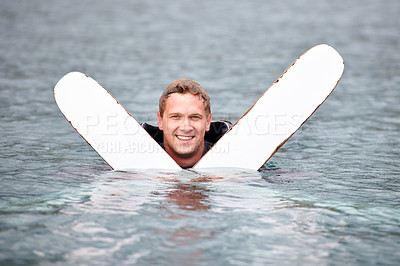 Buy stock photo Man, water ski and portrait in lake, smile and waiting for tow with fitness, extreme sports or exercise. Person, happy and outdoor in river, nature and float with swimming, health and summer training