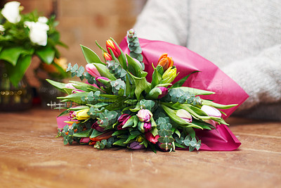 Buy stock photo Closeup, bouquet and florist with startup, flowers and prepare gift for a customer, client and growth. Zoom, female person and entrepreneur with plants, present and floral arrangement with employee