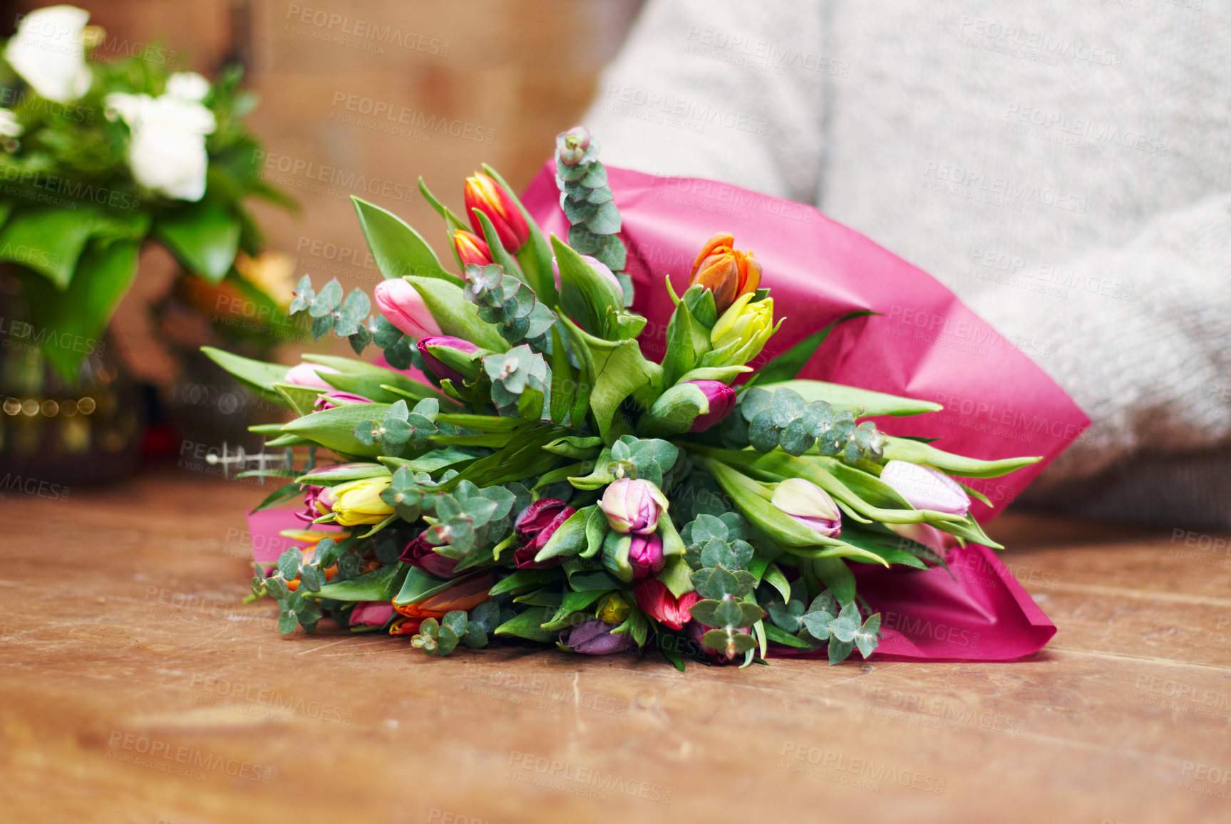 Buy stock photo Closeup, bouquet and florist with startup, flowers and prepare gift for a customer, client and growth. Zoom, female person and entrepreneur with plants, present and floral arrangement with employee