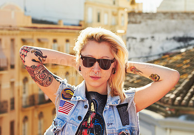 Buy stock photo Tattoo, portrait and fashion woman with sunglasses in city, urban body art and stylish outdoor. Face, rooftop and edgy female person from Canada in cool denim clothes, jacket or serious punk attitude