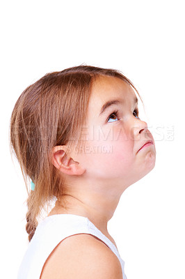 Buy stock photo Face, sad and thinking with a girl child feeling alone in studio isolated on white background. Mental health, depression and emotion with a young kid looking up on space or mockup for disappointment