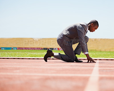 Buy stock photo Start, race track and man in a suit for sport, running and fitness, cardio and speed practice. Starting line, ready and formal male sports runner at a stadium for challenge, performance and workout
